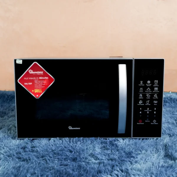Ramtons RM/589 23L microwave oven with grill function, digital touch panel, and sleek black-silver design — available now at Tael Appliances for fast and efficient cooking.