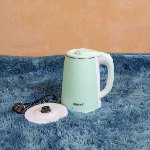 Rebune RE-1-126 2.5-liter electric kettle featuring a food-grade plastic body, 1500W power, 360° rotary base, boil-dry protection, automatic shut-off, and on/off switch. Efficient and user-friendly design for quick boiling. Available now at Tael Appliances.