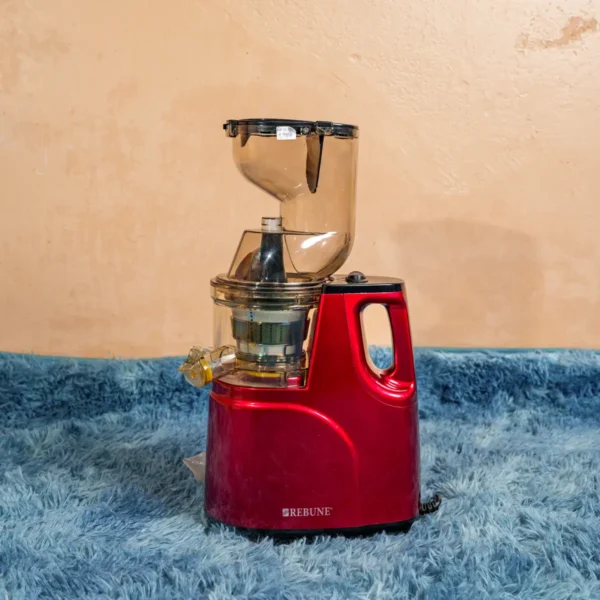 Rebune RE-2-080 slow juicer in wine red featuring a 150W DC motor, dual 1000ml juice and pulp cups, wide 3-inch feed chute for whole fruits, BPA-free Tritan components, and easy-to-clean design. Ideal for extracting maximum nutrition with minimal oxidation. Available now at Tael Appliances.