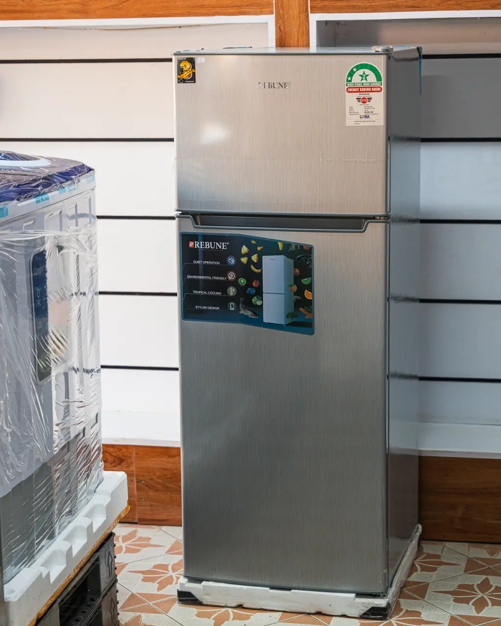 Rebune Fridge 208Ltrs Double Door Silver 3 Rebune 208Ltrs silver double door fridge, angled view showing the 2-star energy label at Tael Appliances.