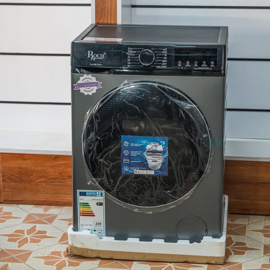 Roch Front Load Inverter Washing Machine 10Kg Dark Grey 2 Roch 10kg dark grey inverter washing machine, angled view showing the A+++ energy label at Tael Appliances.