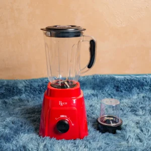 Roch RBL-112C 2-in-1 multifunctional standing blender with grinder attachment, featuring a 1.5L glass jug, 400W motor, stainless steel serrated blades, 2-speed and pulse function, mini-cup for grinding, and a vibrant red base. Durable, efficient, and ideal for smoothies, grinding, and everyday blending tasks. Available now at Tael Appliances.
