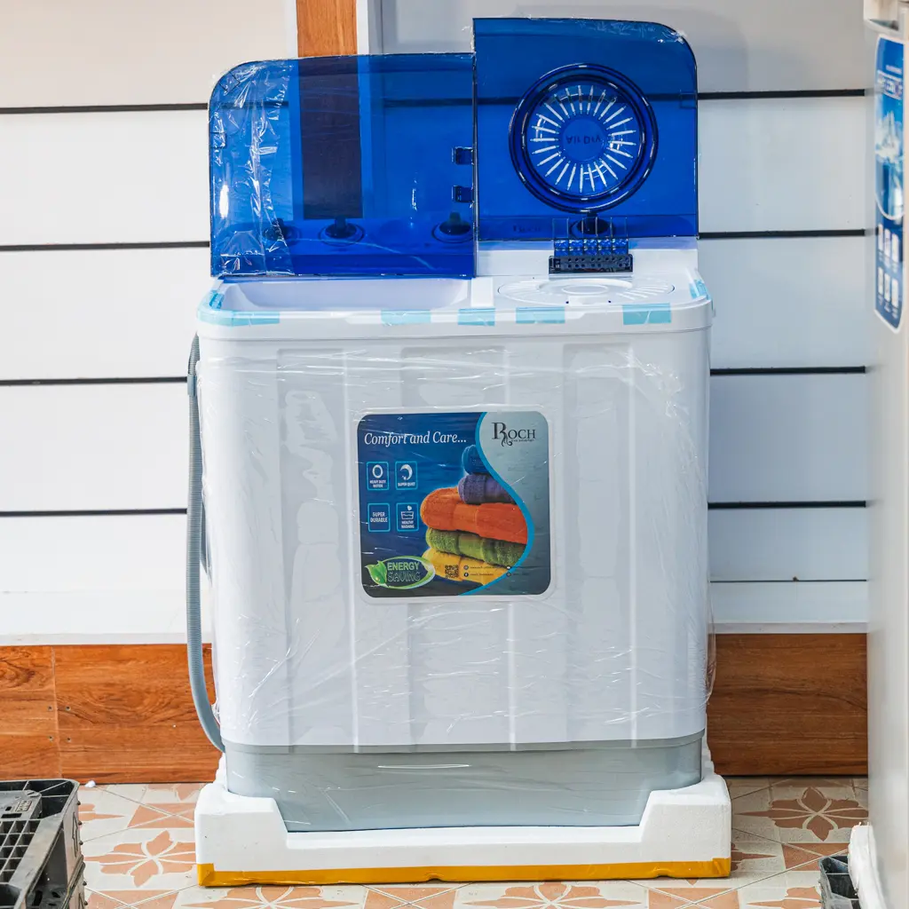 Roch Twin Tub Semi-Automatic Washing Machine 14Kg 3 Roch twin tub washing machine with drain hose, front view at Tael Appliances.