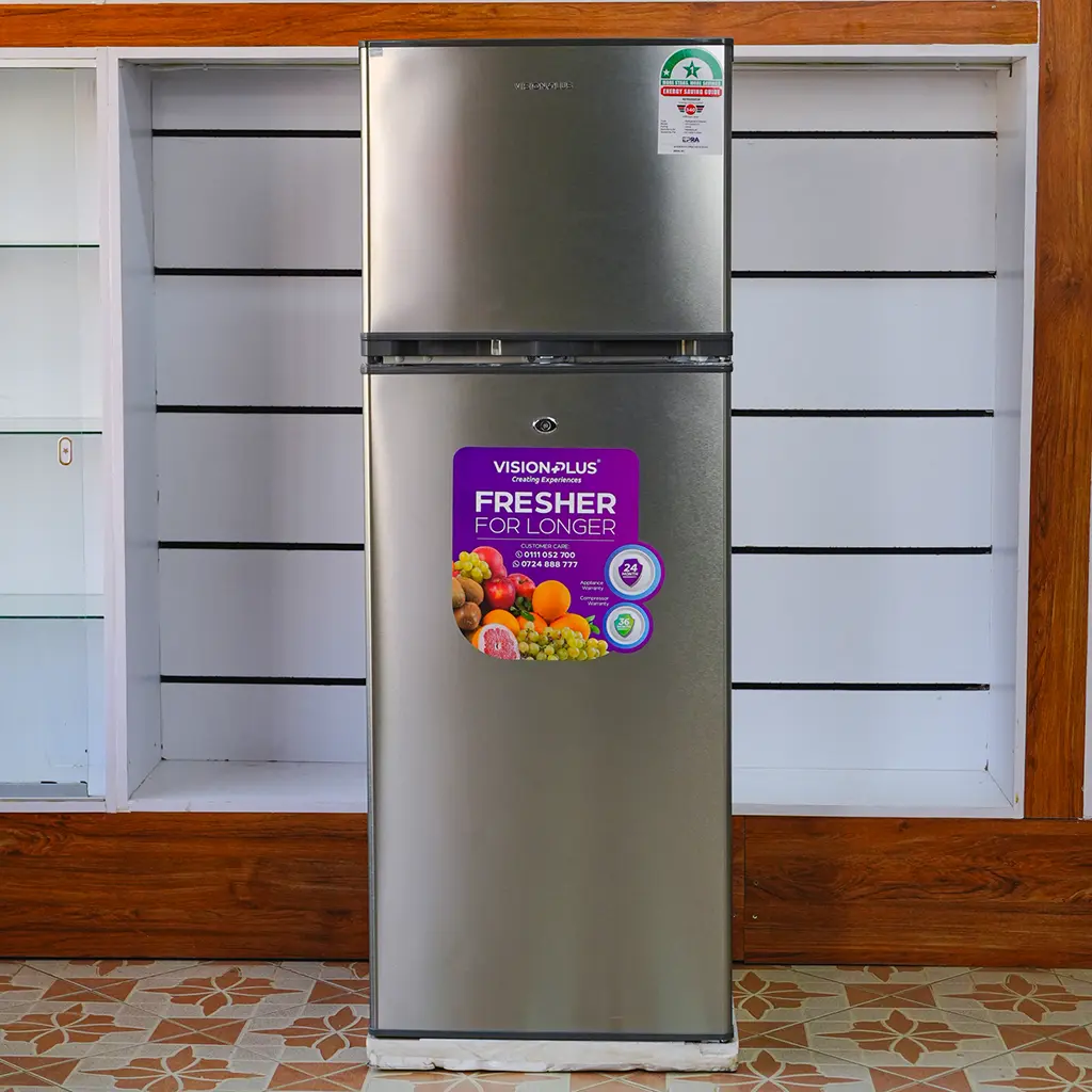 Vision Plus 220Ltrs 7 Vision Plus VPFD220DD-I 220L double door refrigerator in silver – Features spacious freezer compartment, Quick Freeze technology, durable glass shelves, secure lockable doors, and energy-efficient direct cooling. Ideal for medium-sized households. Available now at TAEL Electronics and Appliances.