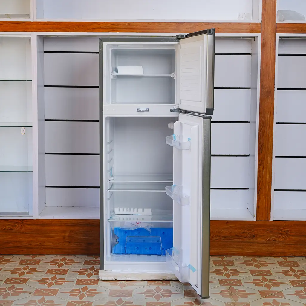 Vision Plus 220Ltrs 2 Vision Plus VPFD220DD-I 220L double door refrigerator in silver – Features spacious freezer compartment, Quick Freeze technology, durable glass shelves, secure lockable doors, and energy-efficient direct cooling. Ideal for medium-sized households. Available now at TAEL Electronics and Appliances.