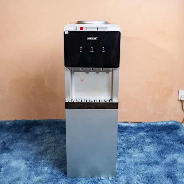 Vision Plus VPWD2HC water dispenser in silver – Features hot (85–95°C), normal, and cold (10–15°C) water taps, electric cooling system, child lock on hot tap, under-storage cabinet, and durable PVC build. Ideal for homes and offices seeking convenient hydration solutions. Available now at Tael Appliances.