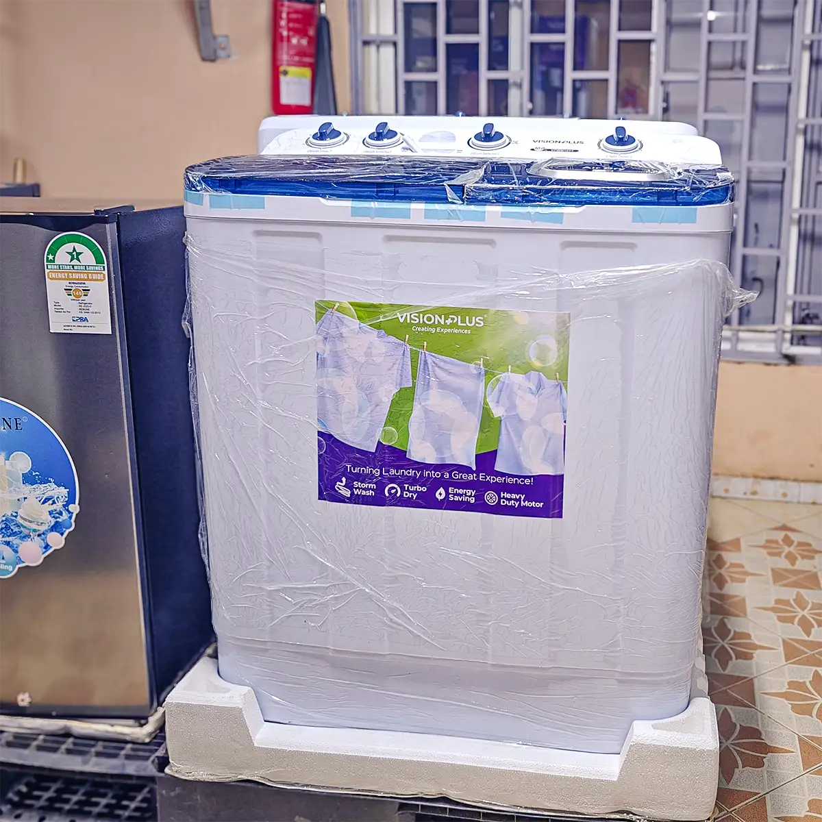 Vision Plus Washing Machine 10Kg 3 Vision Plus washing machine 10kg: VPWM10TT twin tub, top load, Turbo Dry, rodent protection, ideal for large loads, available at Tael Appliances.