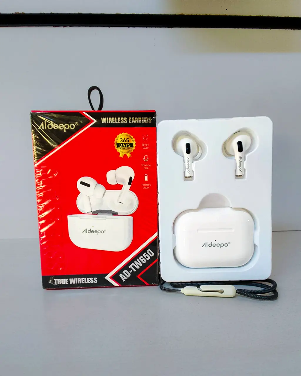 Aldeepo AD-TW650 true wireless earbuds in white with charging case at Tael Appliances.