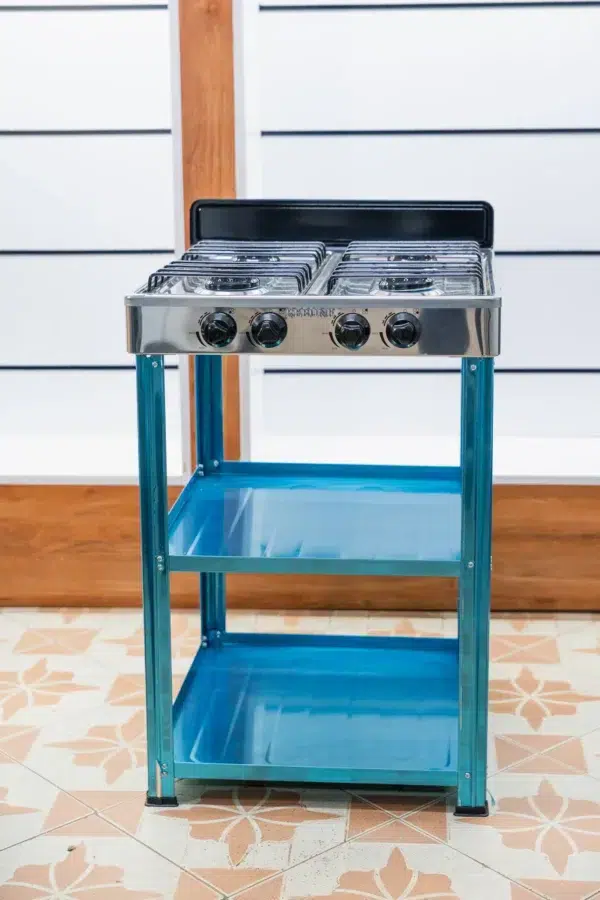 Rebune 4 burner standing gas cooker with stainless steel top and two storage shelves at Tael Appliances.