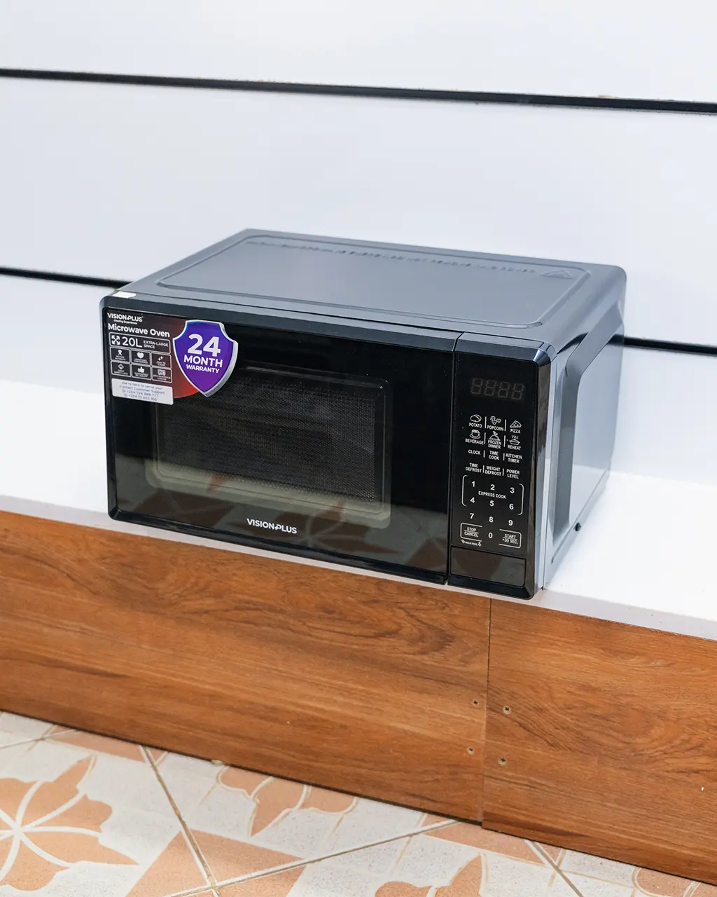 Vision Plus Digital Microwave Oven 20Ltrs 2 Vision Plus 20L microwave oven front view showing the digital control panel at Tael Appliances.