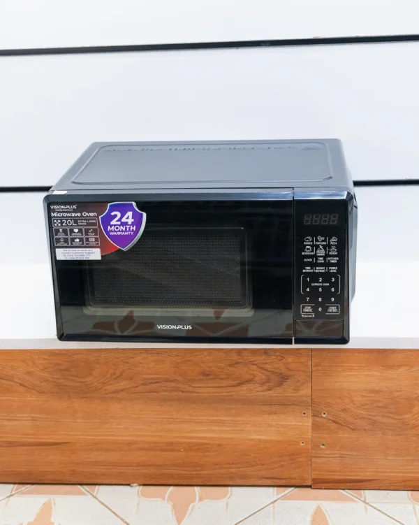 Vision Plus 20 litre digital microwave oven in black with keypad at Tael Appliances.