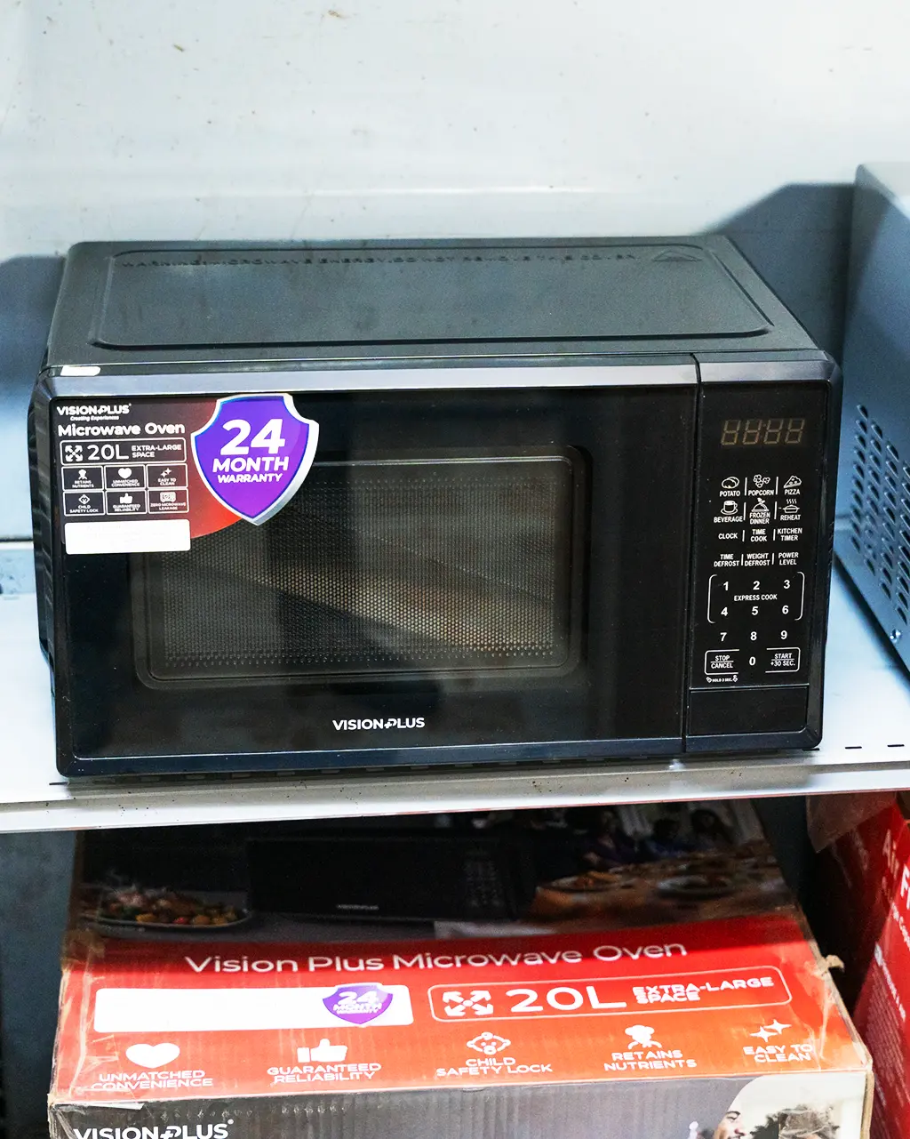 Vision Plus Digital Microwave Oven 20Ltrs 3 Vision Plus 20L digital microwave oven with 24 month warranty badge at Tael Appliances.