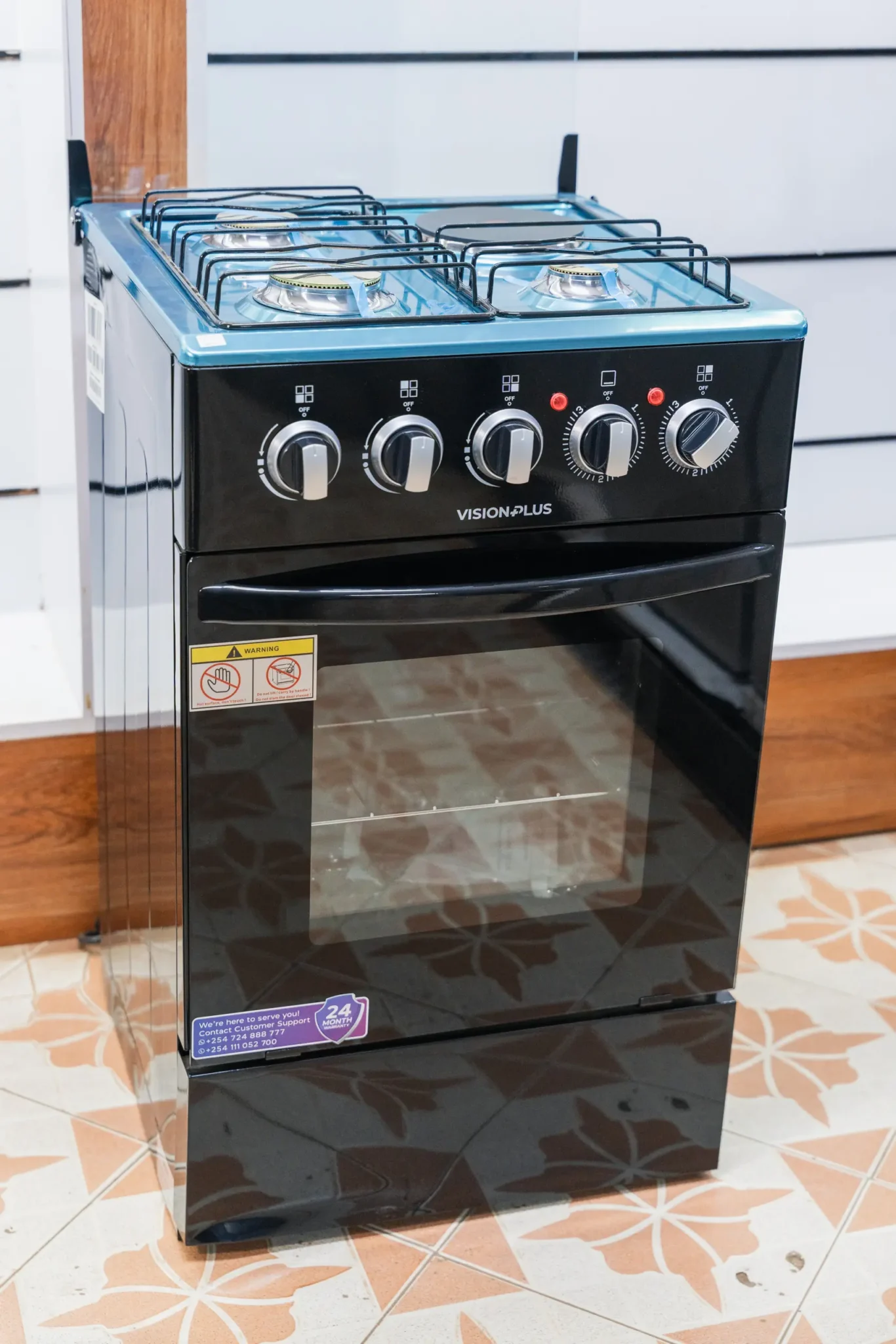 Vision Plus Cooker 50x50 3 Gas 1 Electric Black 5 Vision Plus 50x50 black cooker, angled view showing the five control knobs and glass oven door at Tael Appliances.